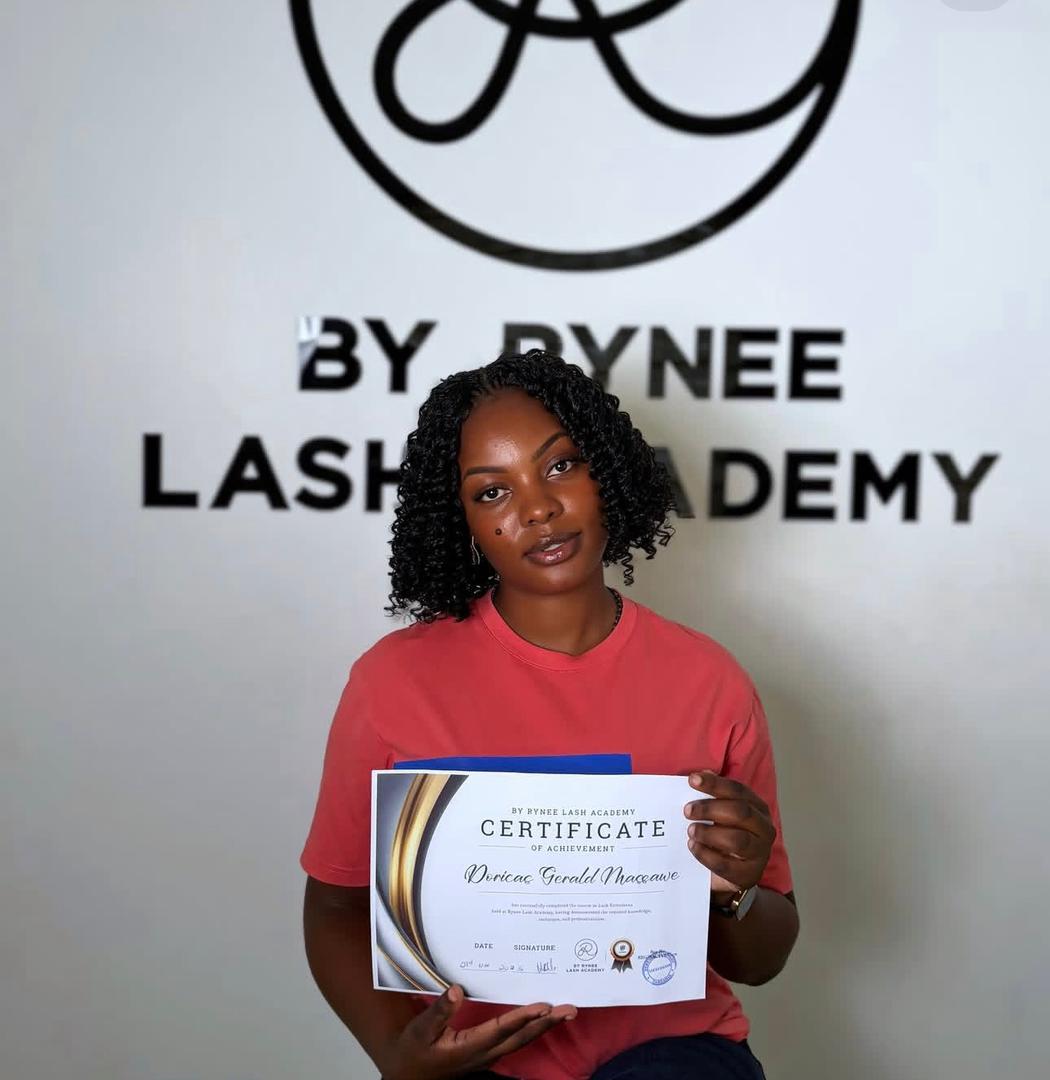 Academy graduate holding certificate